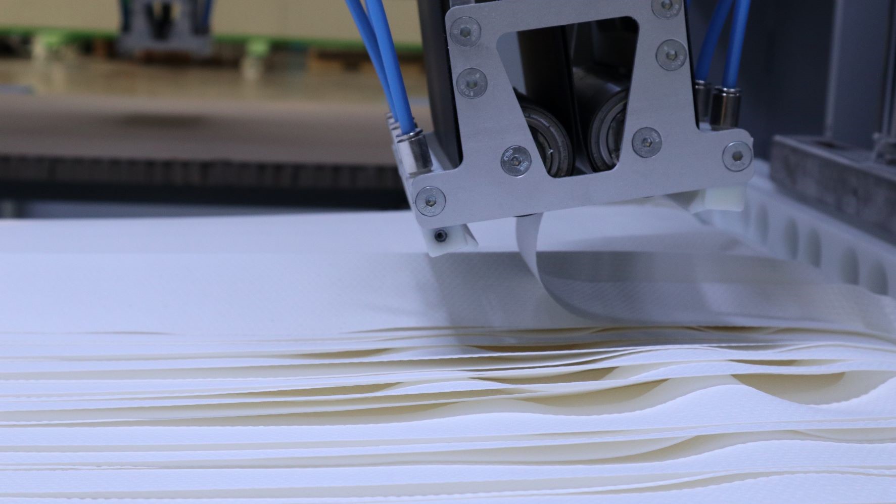 Festooning Solution for delicate and tensionsensitive nonwovens